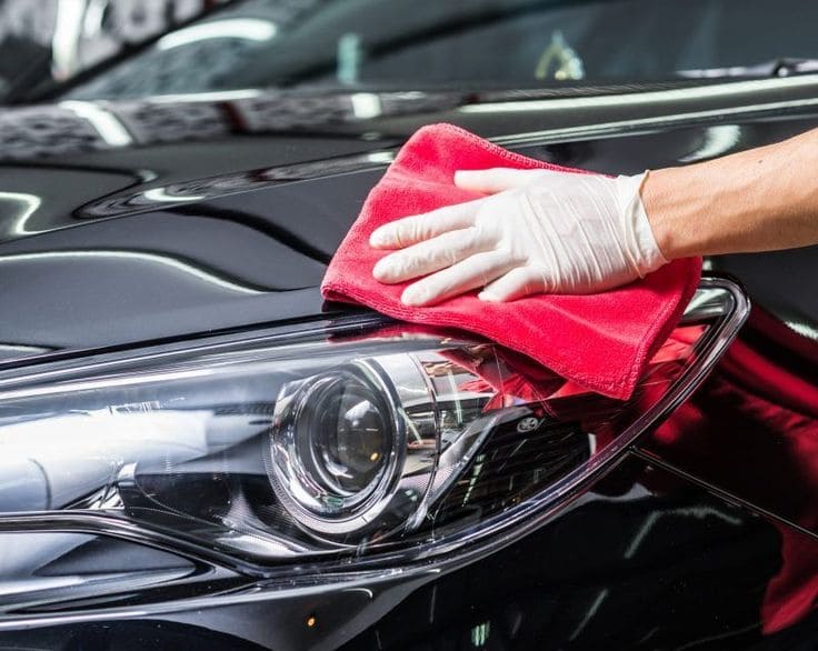 Car is getting cleaned before ceramic coating